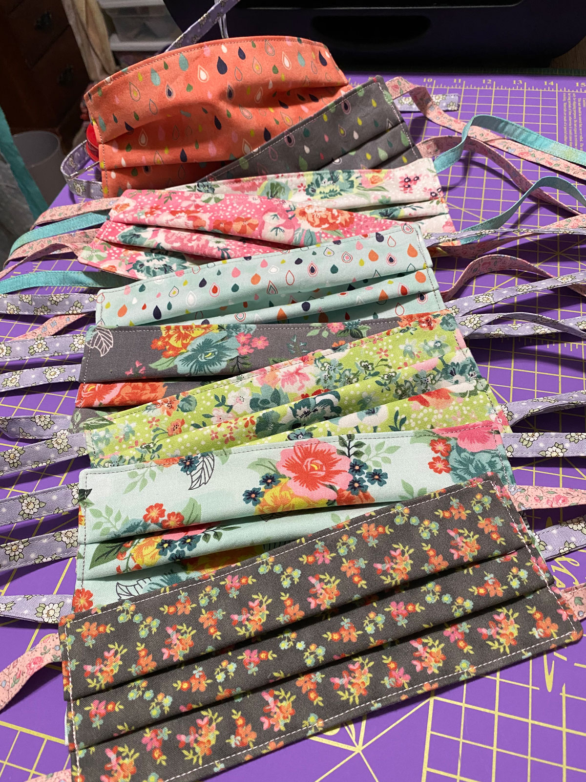 fabric face masks in a variety of floral and patterned fabrics